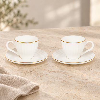 Acar SET820SA Charisma two-cup set with gold-tone rims — AI-assisted cafe table scene